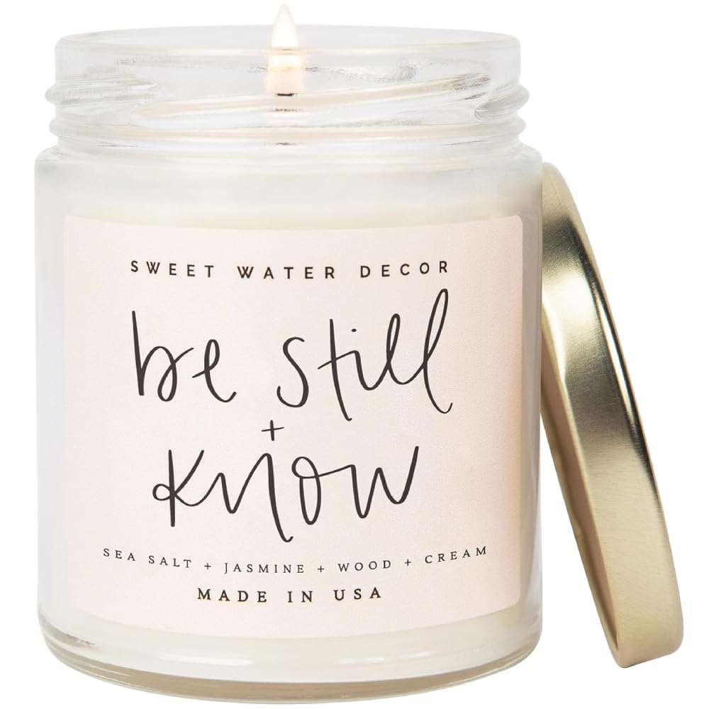 Sweet Water Decor, Be Still and Know, Sea Salt, Jasmine, Cream, and Wood Scented Soy Wax Candle for Home | 9oz Clear Jar, 40 Hour Burn Time, Made in the USA