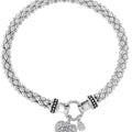 Pulsera elástica con corazón de cristal pavé en tono plateado para mujer de NINE WEST