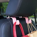 Crochets universels pour appui-tête de voiture Amooca, crochets de rangement pour organisateur de voiture pour sac à main, tissu d'épicerie (lot de 4 rose)